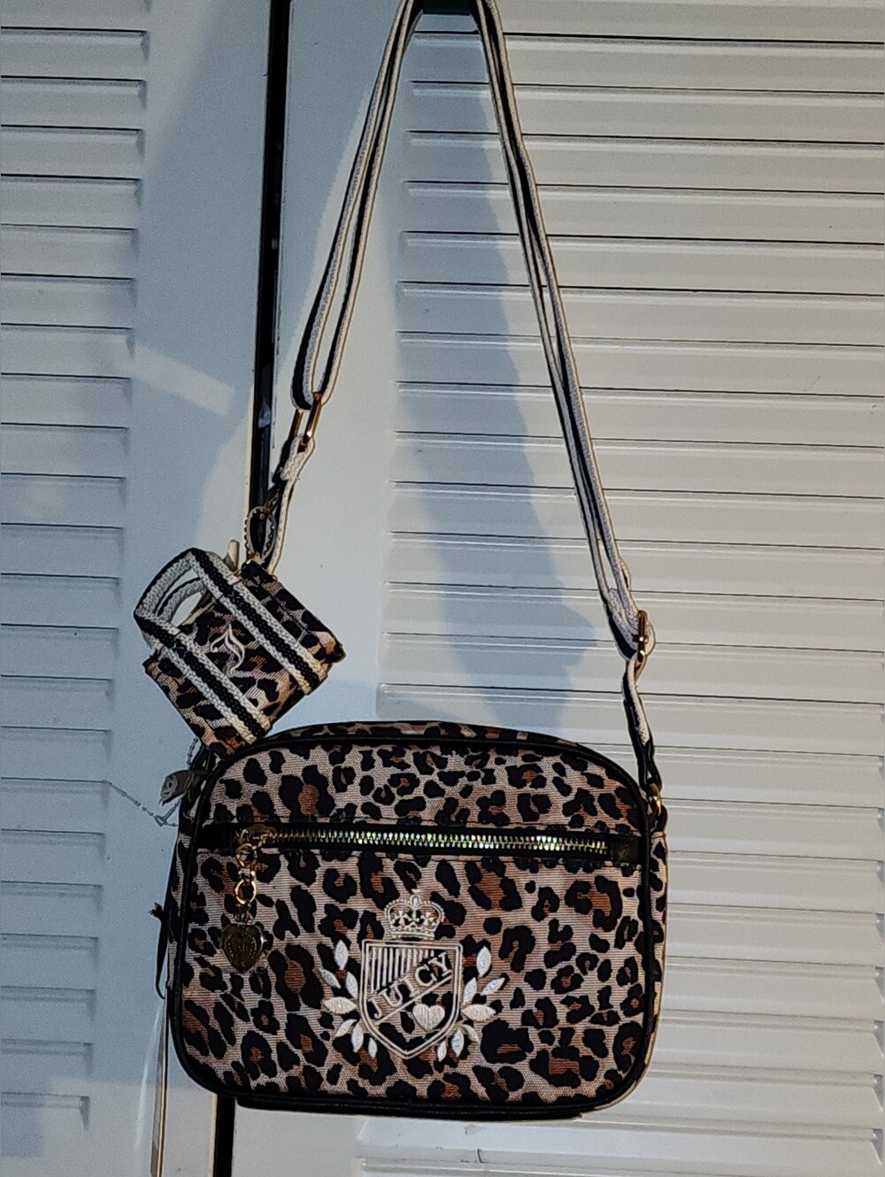 NWT. Juicy Couture Leopard Print Crossbody in Brown and Black with Gold Crest